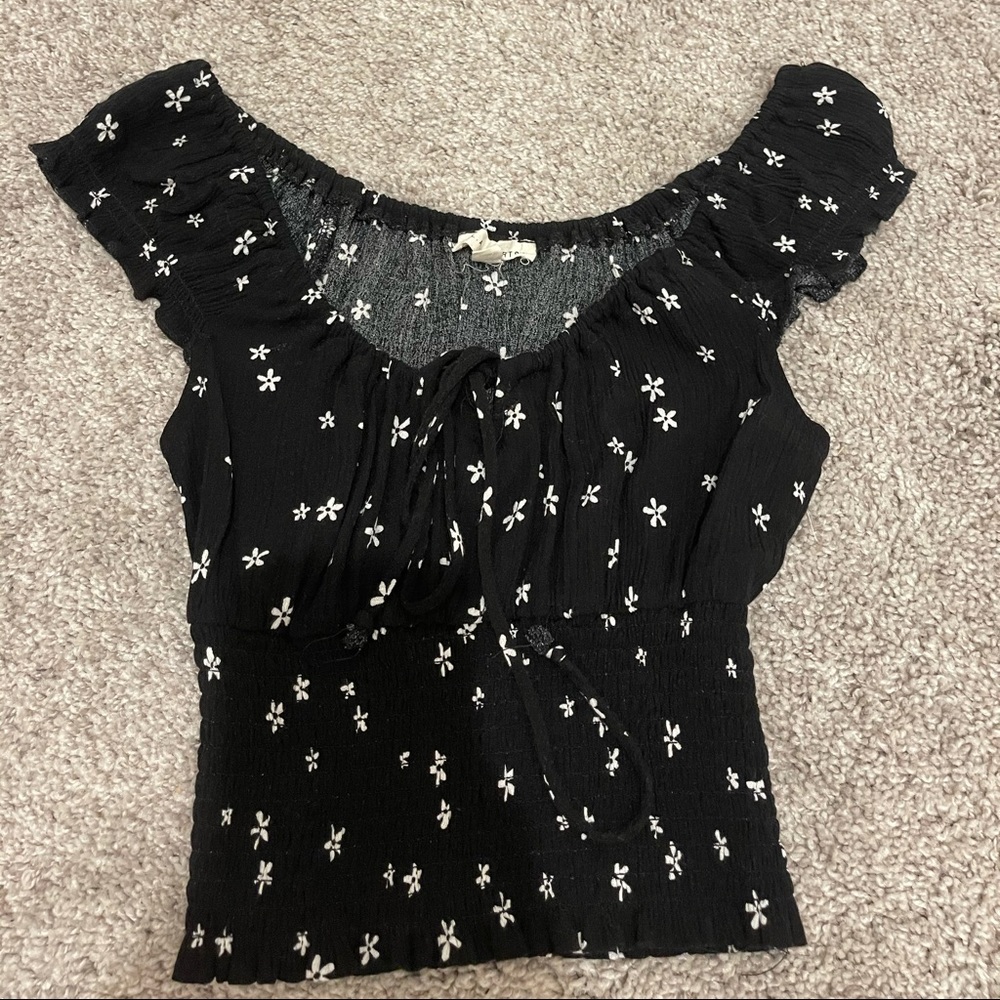 Black top with mini white flowers
